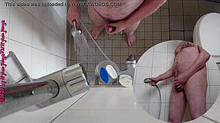 Sexy German babe pisses wildly in the steamy shower.