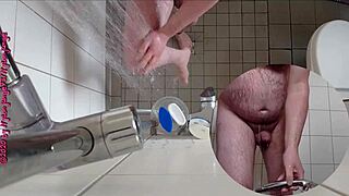 Sexy German babe pisses wildly in the steamy shower.