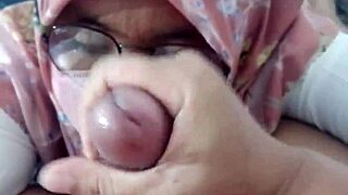Tante Riani Sucks And Enjoys Small Cock Deep In Her Chubby Asian Mouth.