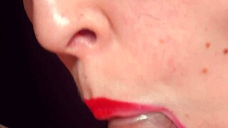 wanna see red lips lick penis in condom up close?