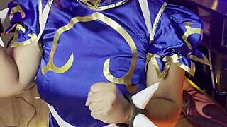 thick chun-li cosplay girl poses her huge curves in backstage photoshoot making of