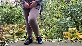 mature bbw pees outside in park
