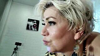 mature chick in leopard bodysuit enjoys pleasure
