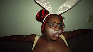 Kinky easter bunny spits on pierced ebony boobs
