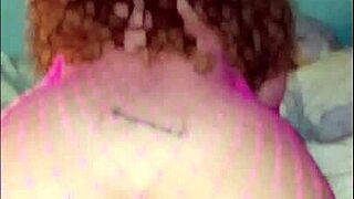 Curly redhead pawg in pink fishnet rides raw and takes full creampie deep in her pussy pov