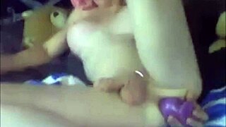 Pink-haired milf shemale penetrates her ass