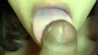 hot brunette sucking and stroking cock up close