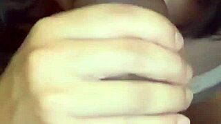 hot brunette sucking and stroking cock up close