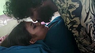 wife shares sweet kisses with her husband in bed