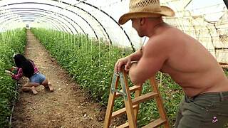 Yasmin smokes near ripe tomatoes