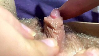 Huge clit throbs in extreme closeup jerk to squirting orgasm